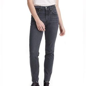 LEVI’S 501 skinny black jeans with raw edge hem